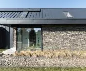 On the street side, architects have reduced the number of windows