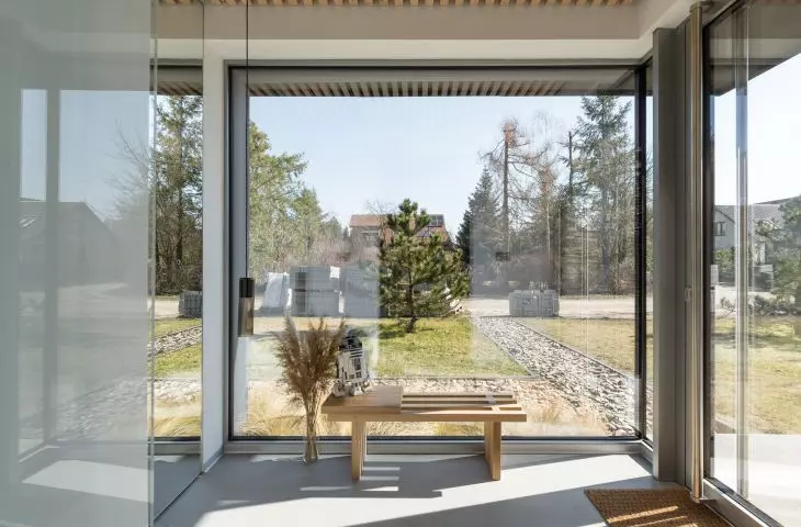 Large glazing illuminates the house