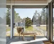 Large glazing illuminates the house