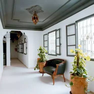 Massive wooden furniture is a hallmark of the Moroccan style