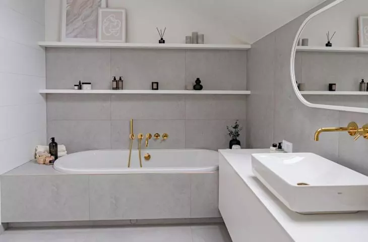 The bath area has a built-in bathtub