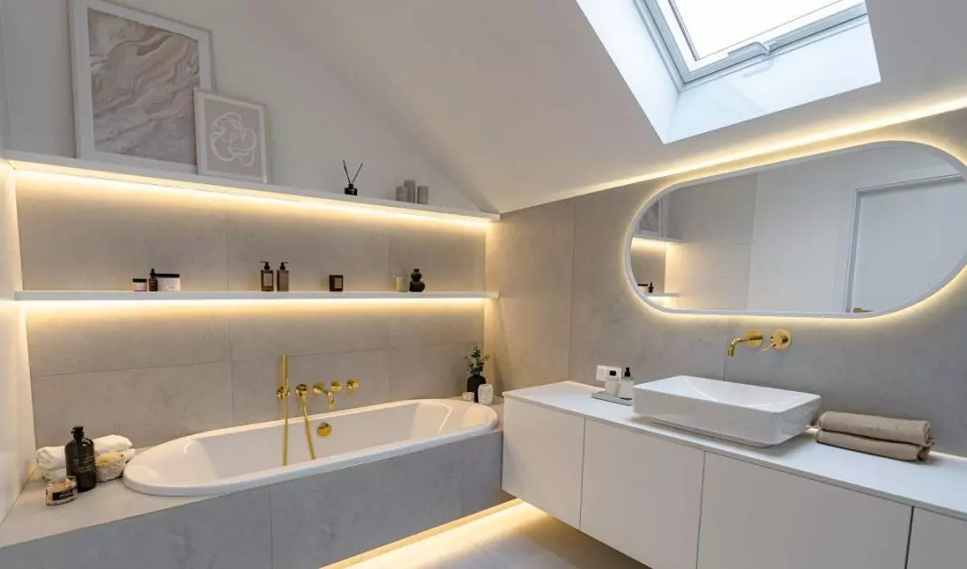 Ola's bathroom is distinguished by modern, rounded forms