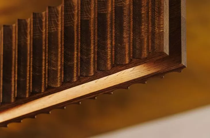 Distinctive designer lamp and bakery logo in the background