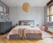 The bedroom is kept in shades of gray