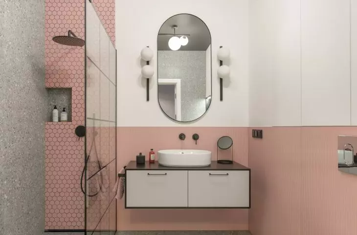 The bathroom also relates in color to the whole apartment
