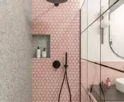 Pink tiles and terrazzo wall in the shower