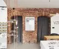 Salon powstał w kamienicy, a w jego wnętrzach architektki zdecydowały się na odsłonięcie cegły i pozostawieni łuków