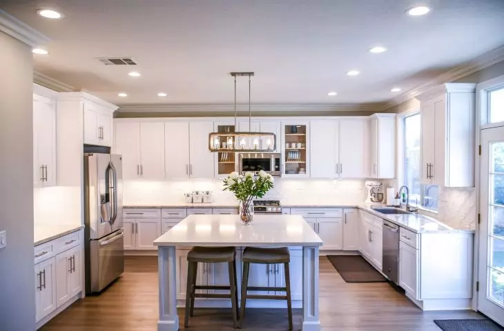 A white kitchen is one of the hallmarks of this style