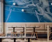 The triangular stools are the Finn model of the Buck.Studio project