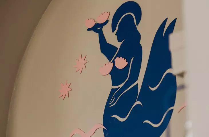 mermaid in the premises logo