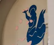 mermaid in the premises logo