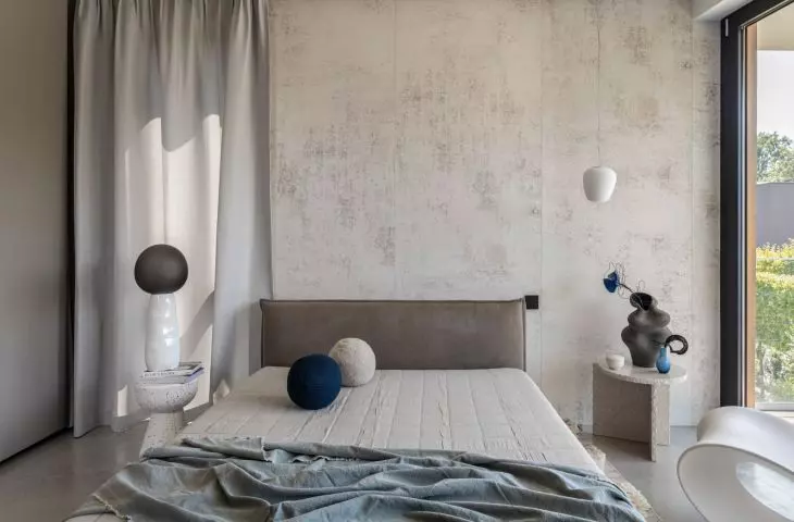 The interior of the bedroom is very minimalist and austere