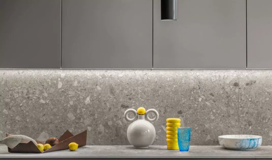 The kitchen harmonizes in color with the rest of the house