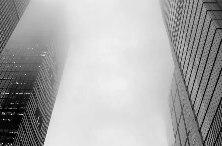 Tops of Hudson Yards buildings fading into clouds