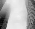 Tops of Hudson Yards buildings fading into clouds