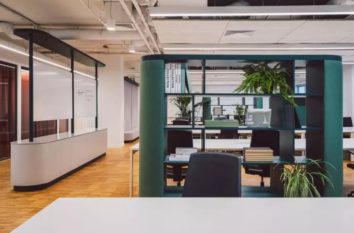 Work spaces are divided by mobile furniture