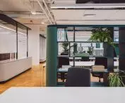 Work spaces are divided by mobile furniture