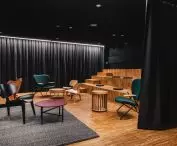 Cinema hall with wooden steps forming an auditorium