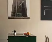 An island between the kitchen and dining room