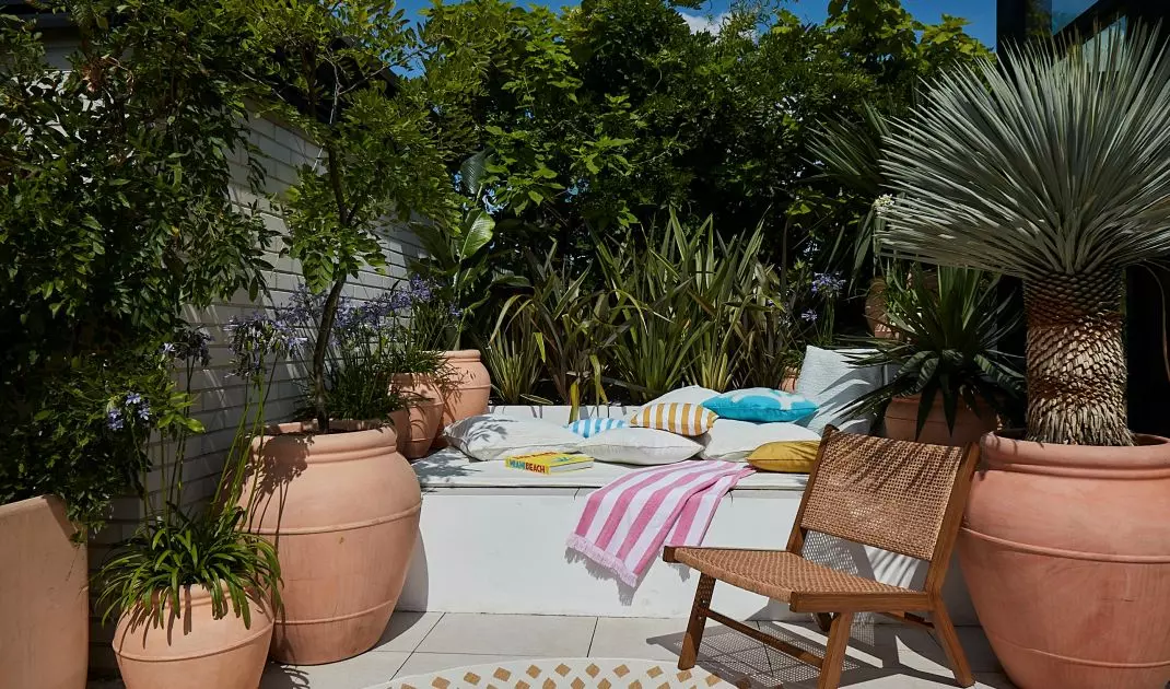 Lounge furniture is decorated with a mass of colorful cushions