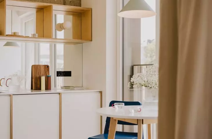 Architects have cleared space for a round dining table