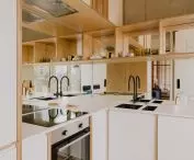 Also, the kitchen's built-in cabinets were designed by Anna Haudek and Joanna Major