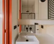 bright bathroom with black accents
