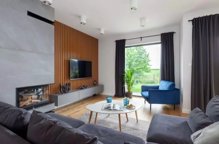 This arrangement is dominated by a combination of wood and navy blue 
