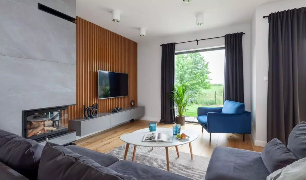 This arrangement is dominated by a combination of wood and navy blue 