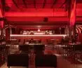 Interior of the restaurant, main bar in the background
