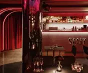 Characteristic elements of the design are rounded lines and neon signs