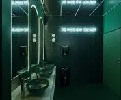 Green bathroom with neon