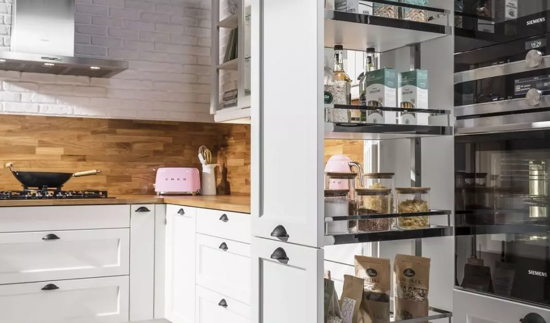 The built-in cabinet is the perfect place for a mini pantry