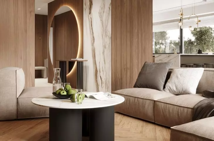 In the corridor there is a large round mirror with striking backlighting