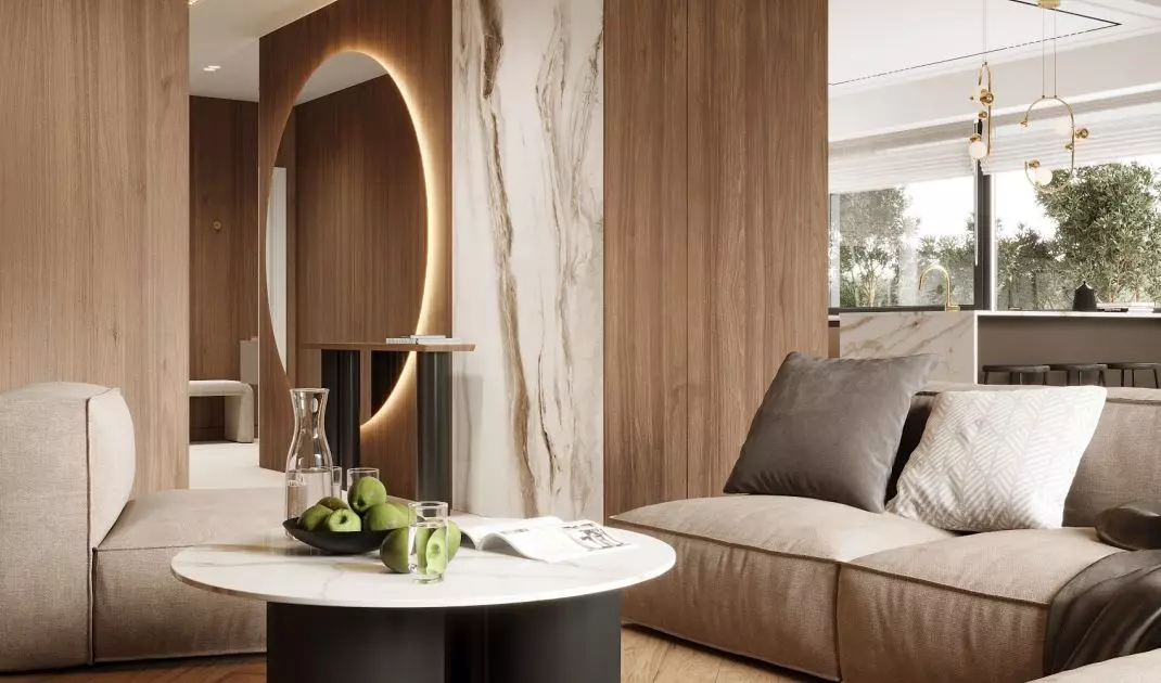 In the corridor there is a large round mirror with striking backlighting