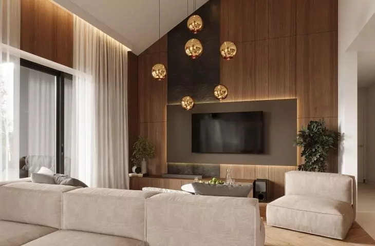 The modular rest faces both the TV and the greenery outside the window