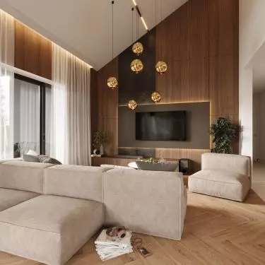 The modular rest faces both the TV and the greenery outside the window