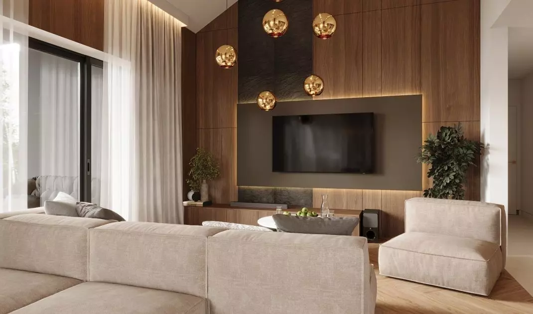 The modular rest faces both the TV and the greenery outside the window