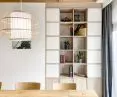 The recessed cabinet in the dining room was designed by architects