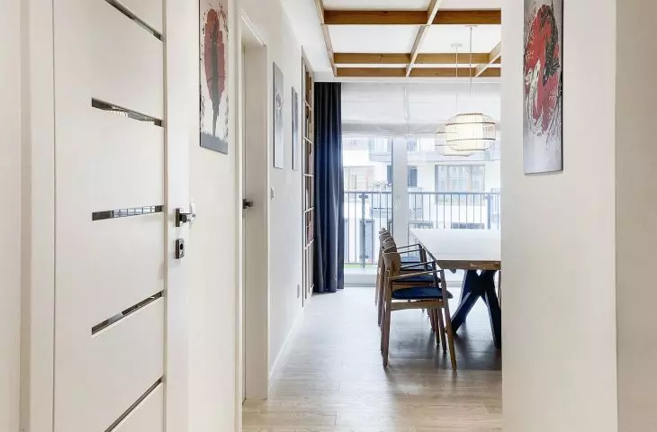 A jany hallway leads to the dining room