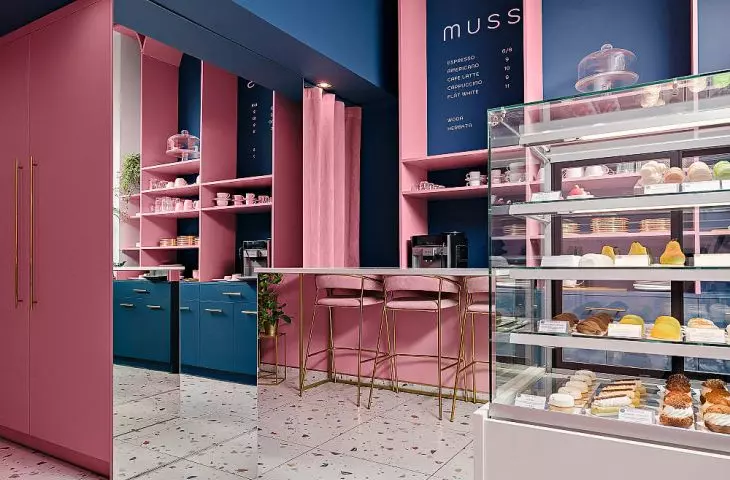 small interior is optically enlarged by ubiquitous mirrors