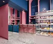 small interior is optically enlarged by ubiquitous mirrors