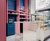 The interior is designed in contrast to the gray facade
