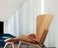 The Reader armchair with footrest