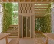 A staircase and a wide staircase lead to the first floor