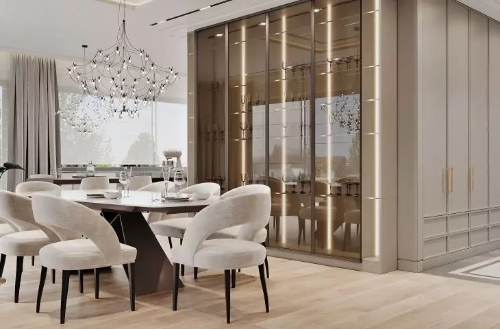 In the dining room you will find a glass display case in champagne colors