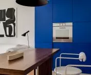 A sizable wooden kitchen table surrounded by stylish SAGE chairs by Polish brand The Good Living