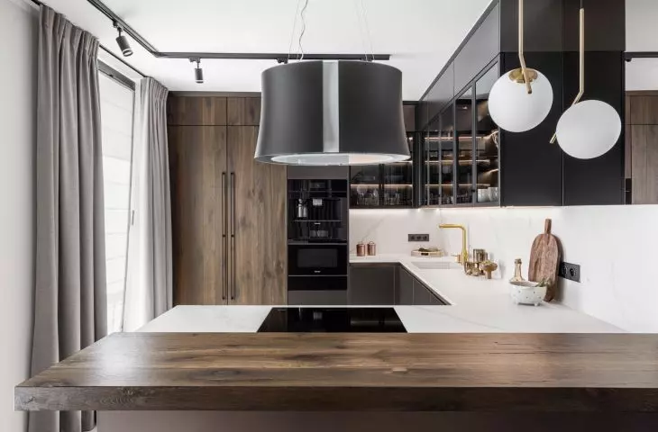 The kitchen is kept in a minimalist style 