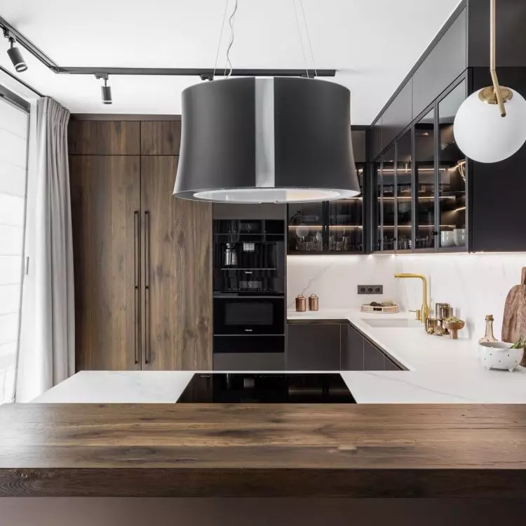 The kitchen is kept in a minimalist style 