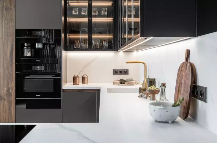  Gold faucet adds a touch of glamour to the styling